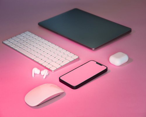 Modern aesthetic desk layout showing digital screens
